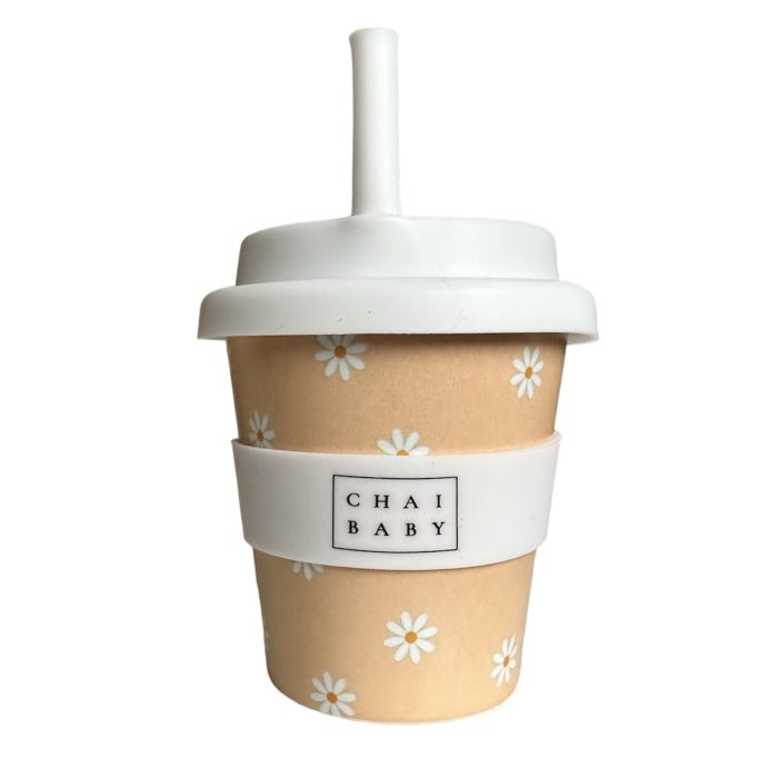 A Tan babyccino cup with delightful daisy design.