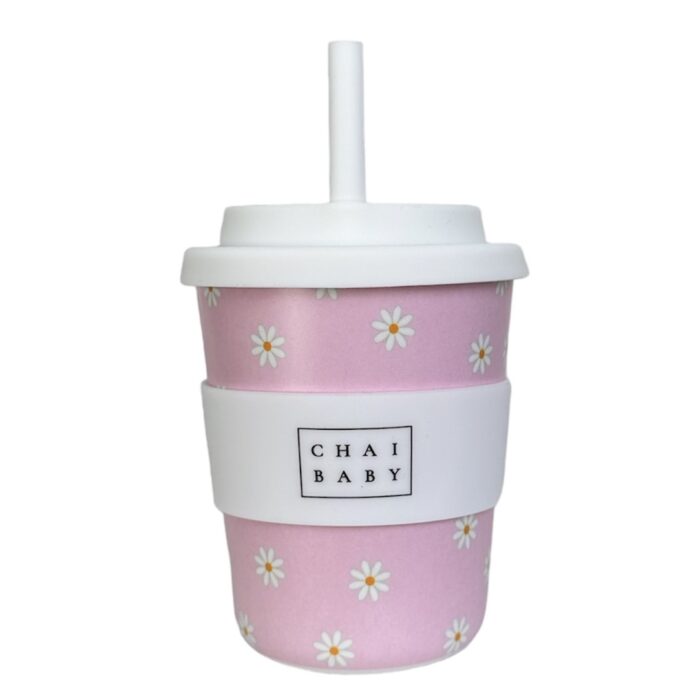 A kids keep cup that is 240mls and has pink background with white daisy flowers on it. It has a white silicone lid and band and a white straw.